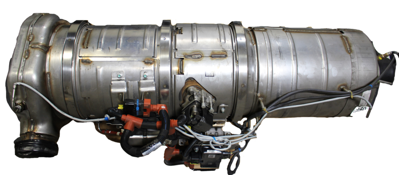 Photograph of a Cummins diesel engine aftertreatment device (ATD)